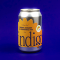 Load image into Gallery viewer, A can of indigo mandarin, bergamot and lemon myrtle soda on a blue background. 
